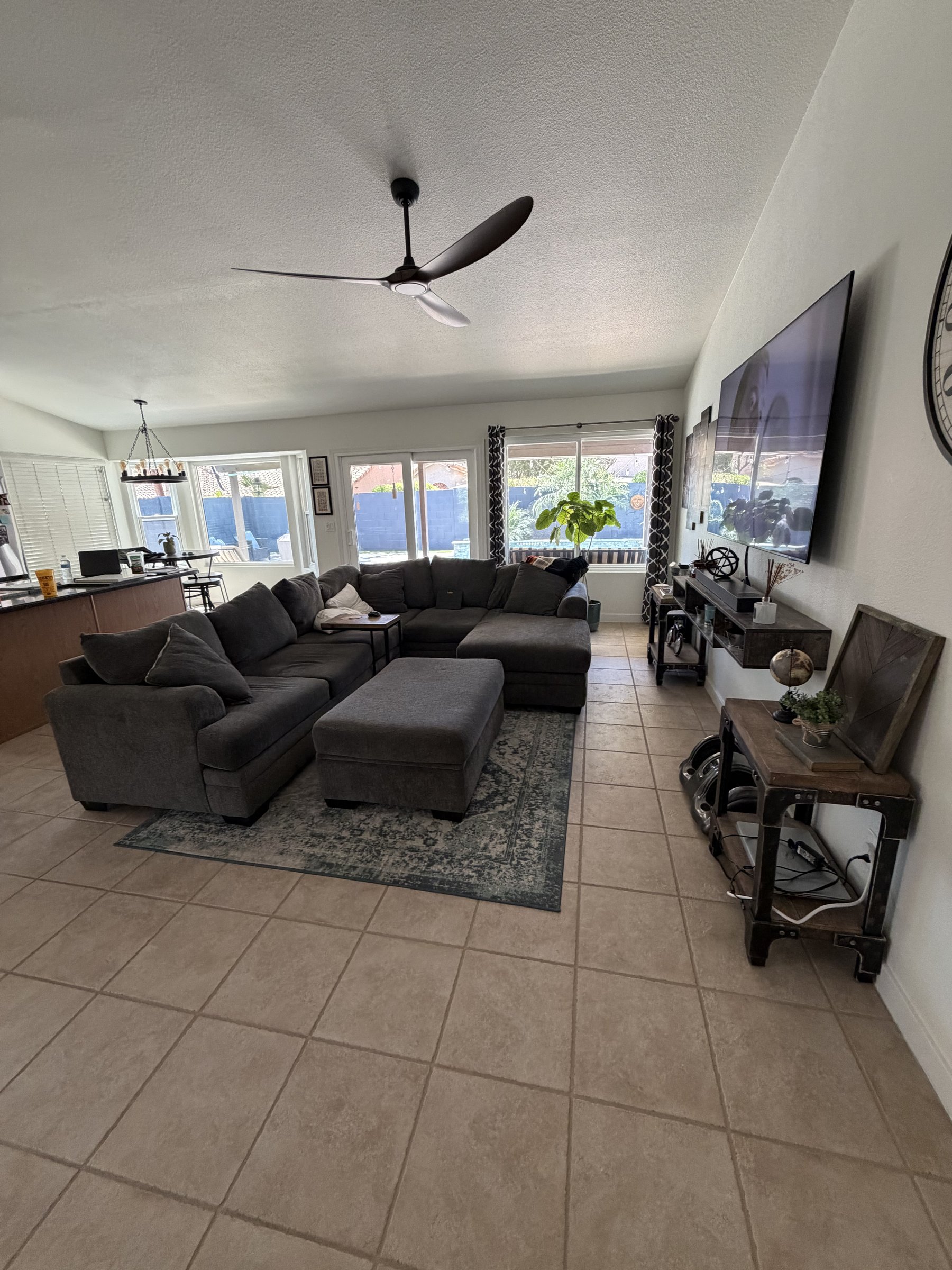 Original tile flooring in the adjoining living room before Phoenix remodel