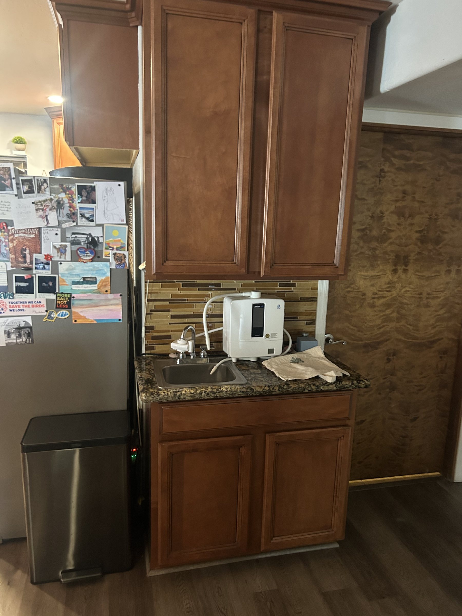 Original cherry cabinetry and gold tile backsplash at the secondary sink, Phoenix remodel